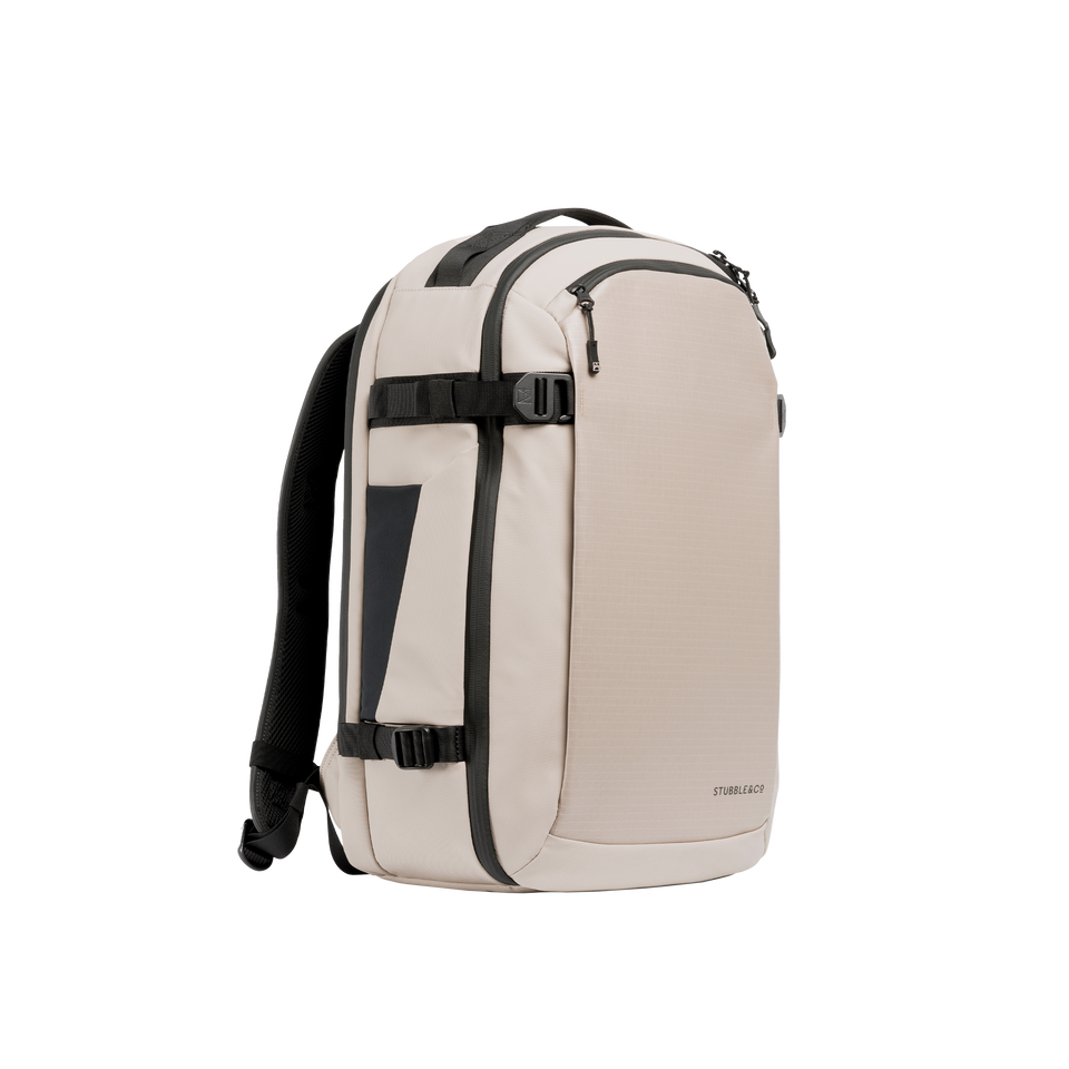 A studio shot of the front and side of a hybrid backpack 30l as cut out transparent PNG-  sand