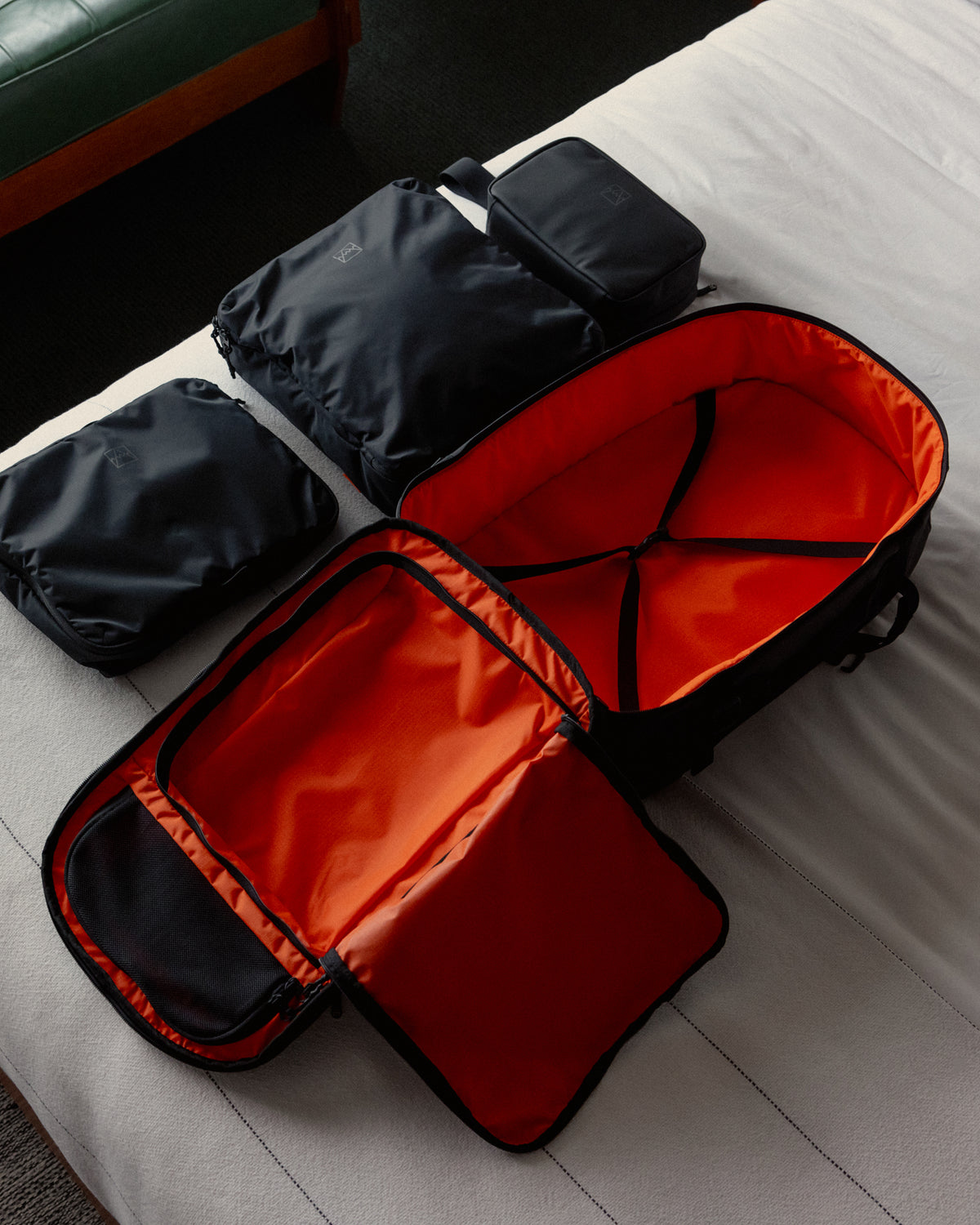 Packing Bed How to Use Packing Cubes for Travel | Stubble & Co