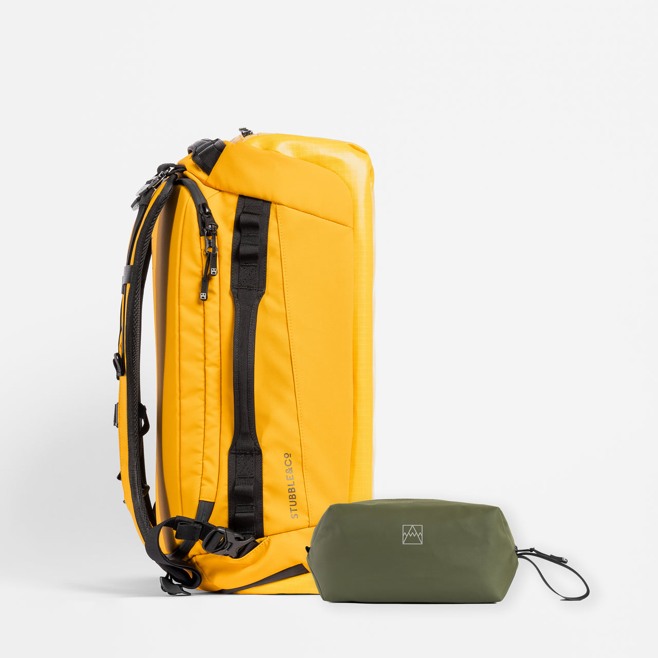A studio shot of the Kit Bag in Yellow / Urban Green Wash Bag bundle