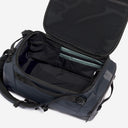 A studio shot of the interior compartment within the Kit Bag 30L in Midnight Blue