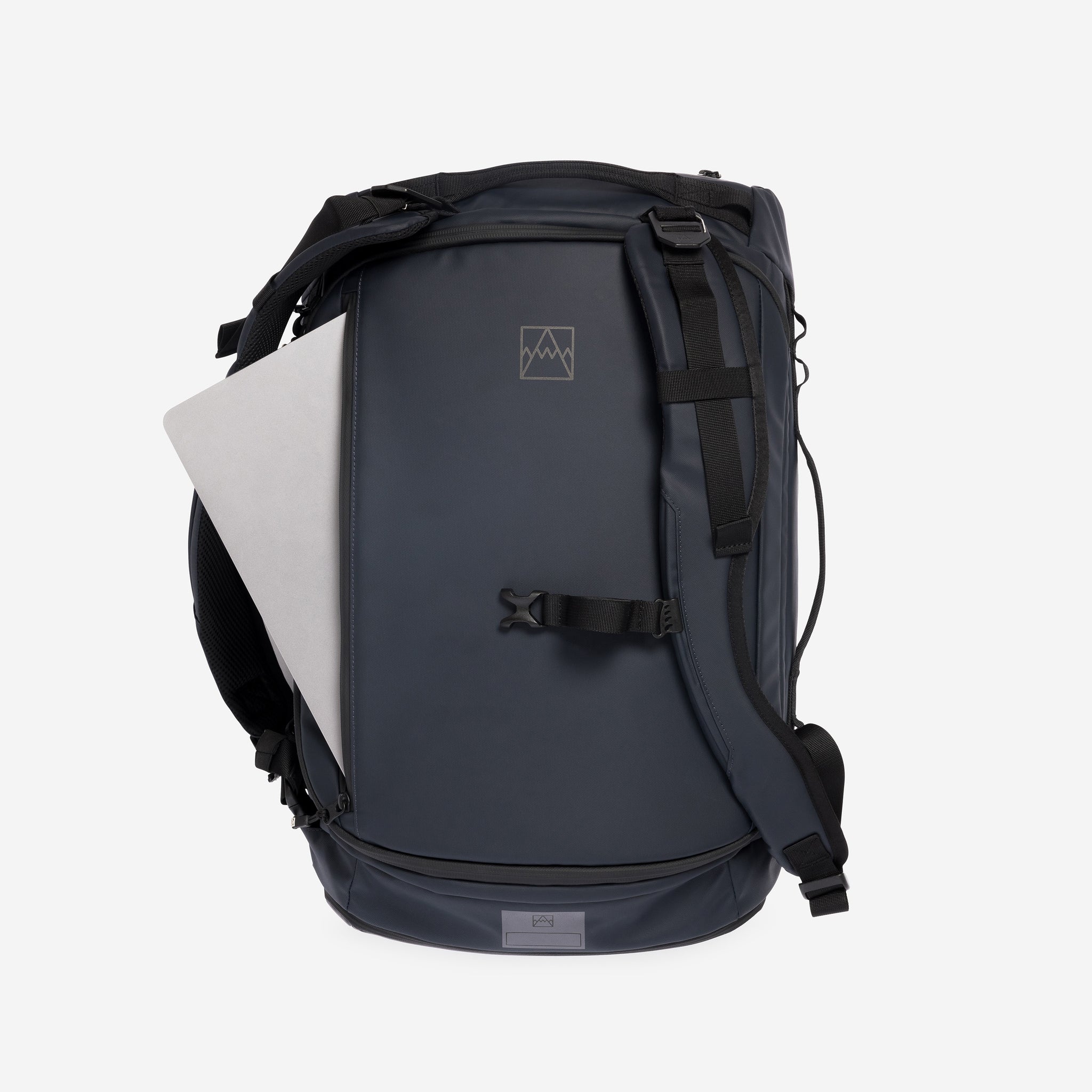 A studio shot of the laptop compartment on the Kit Bag 30L in Midnight Blue