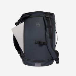 A studio shot of the laptop compartment on the Kit Bag 30L in Midnight Blue