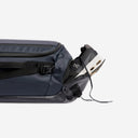 A studio shot of the shoe compartment on the Kit Bag 30L in Midnight Blue