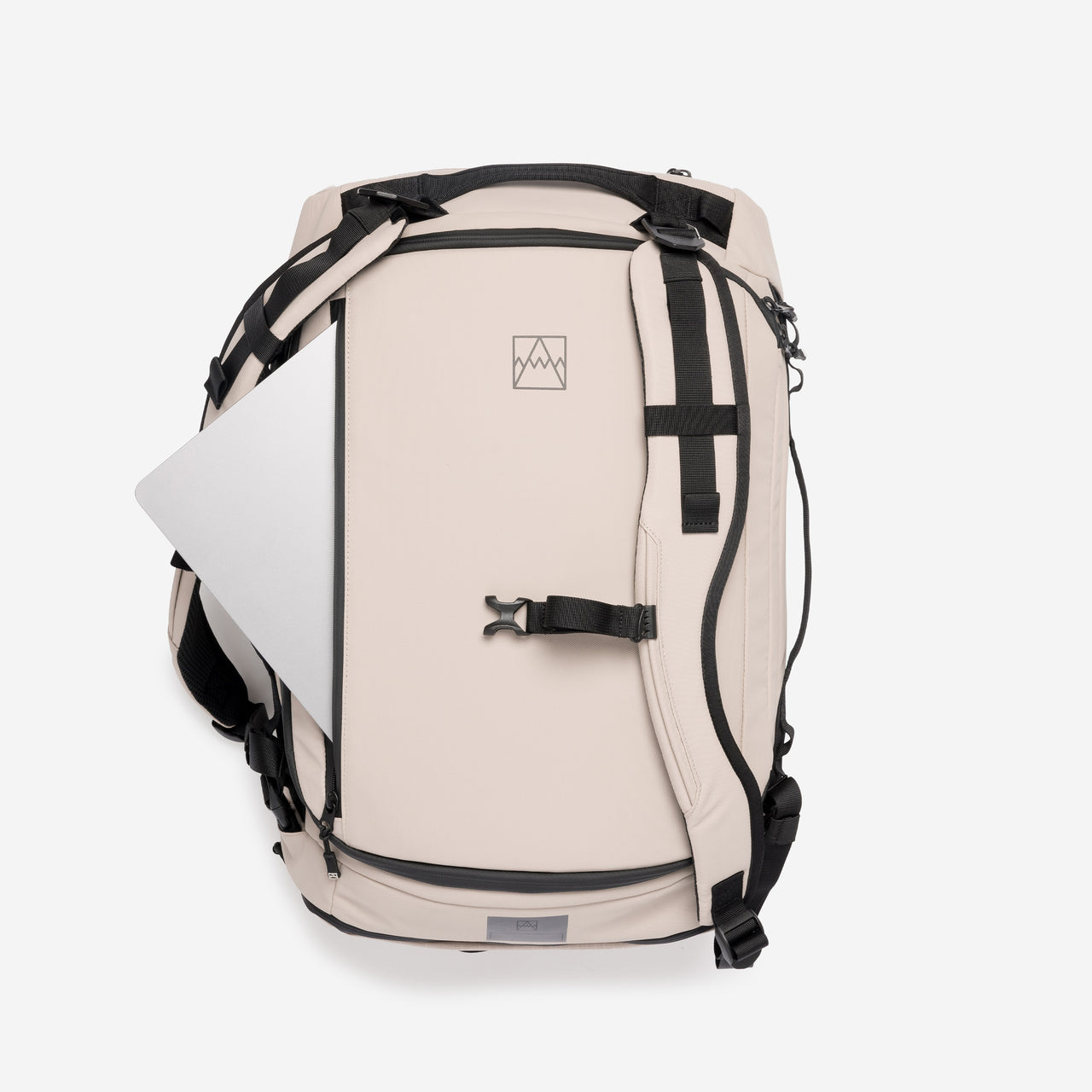 A studio shot of the laptop compartment on the Kit Bag 30L in Sand