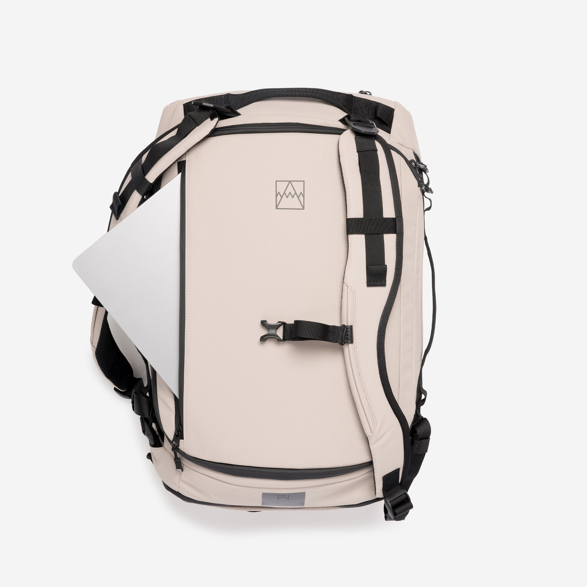 A studio shot of the laptop compartment on the Kit Bag 30L in Sand