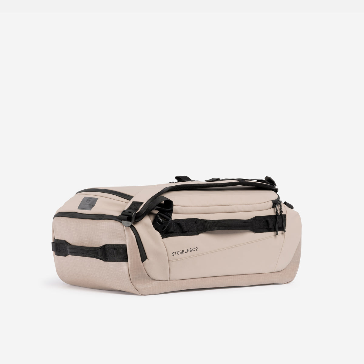 Kit Bag 30L in Sand resting horizontally against a plain white background.