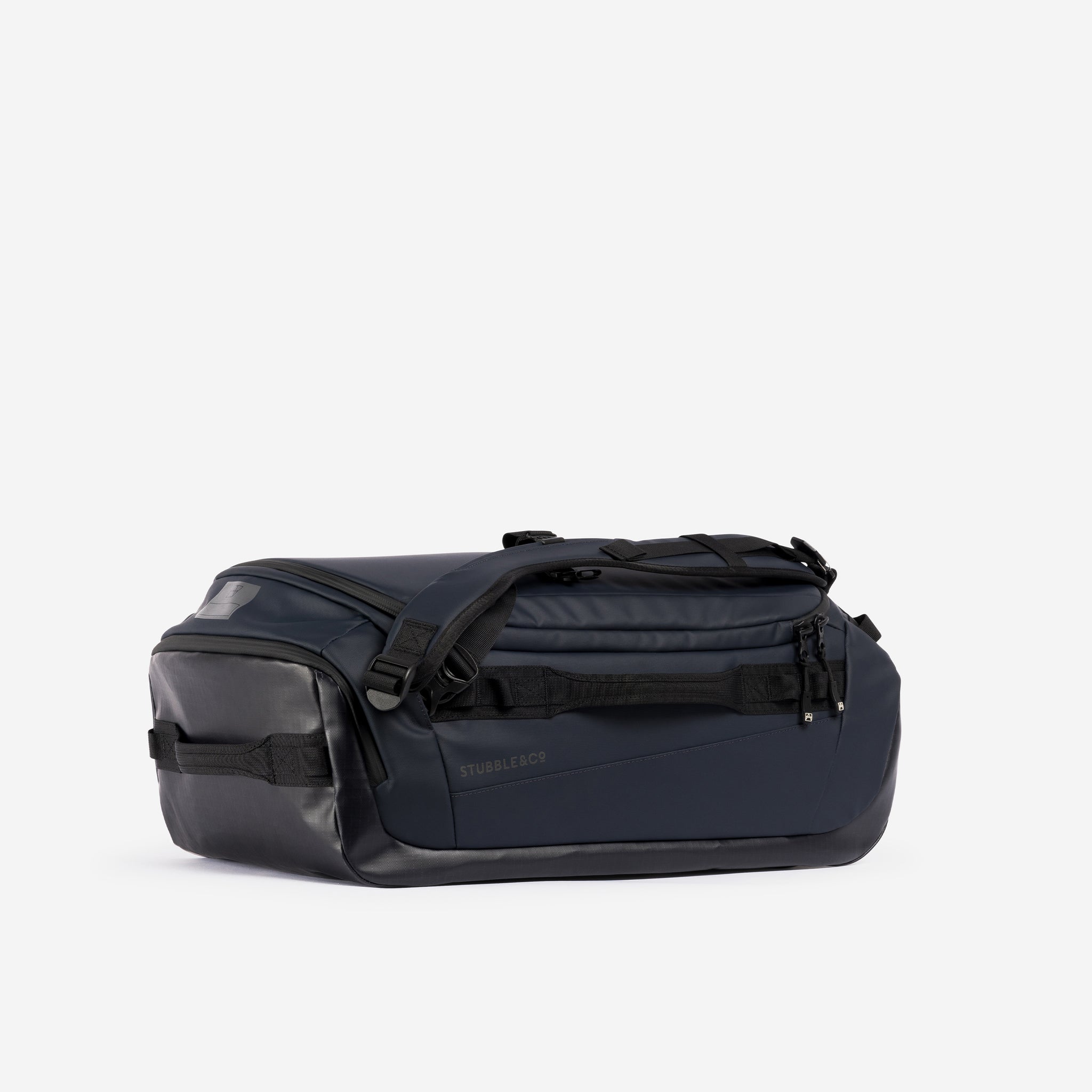 Kit Bag 30L in Midnight Blue resting horizontally against a plain white background.