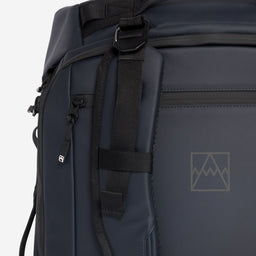 A close up of the adjustable and removable straps on the Kit Bag 40L in Midnight Blue