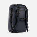 A studio shot of the front and chest straps on the Kit Bag 40L in Midnight Blue