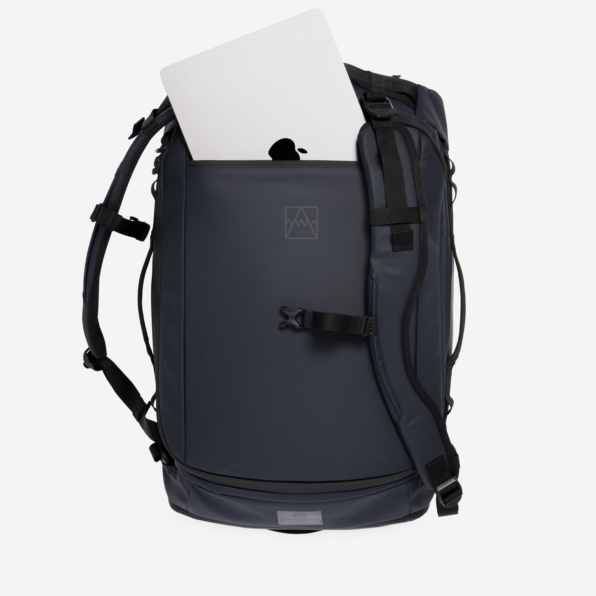 A studio shot of the laptop compartment on the Kit Bag 40L in Midnight Blue