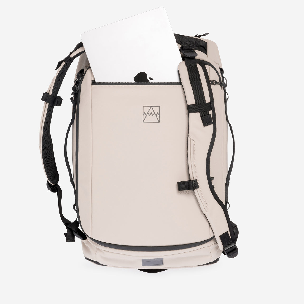 A studio shot of the laptop compartment on the Kit Bag 40L in Sand
