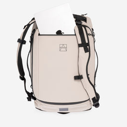 A studio shot of the laptop compartment on the Kit Bag 40L in Sand