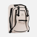 A studio shot of a kit bag 40l in Sand showing the front, side and chest-straps
