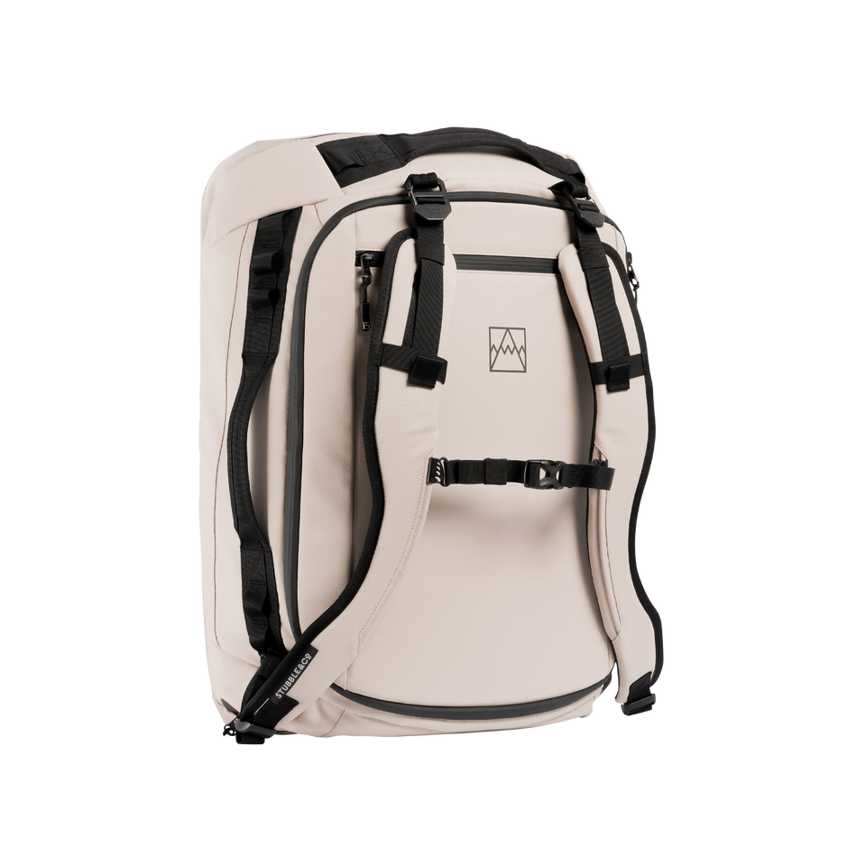 A studio shot of the front and side of Kit Bag 40L as cut out transparent PNG- sand