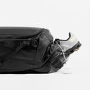A studio shot of the shoe compartment on a black kit bag 40l [All variants]