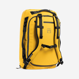 A studio shot of the Yellow Kit Bag 40L standing on its edge at an angle