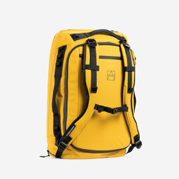 A studio shot of the Yellow Kit Bag 40L standing on its edge at an angle- shop all