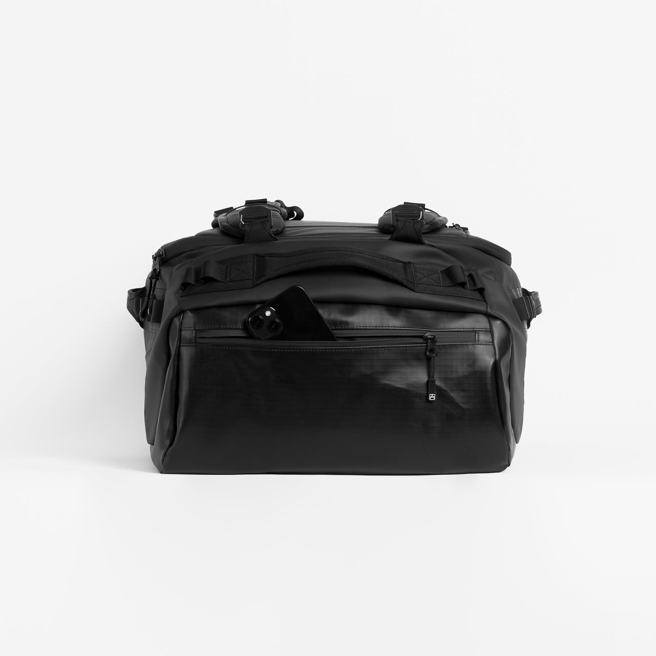 A studio shot of the phone pocket on an All Black Kit Bag 65L