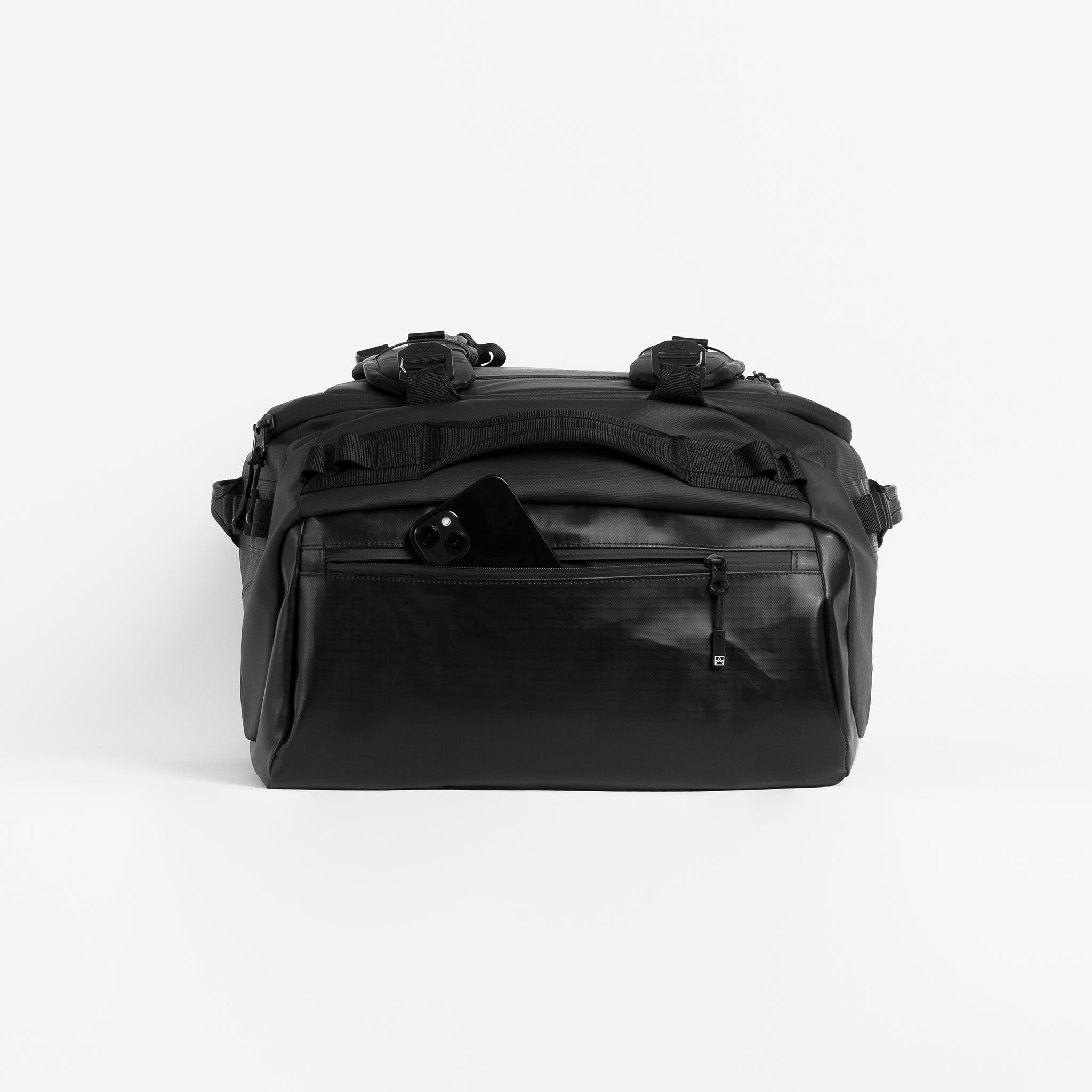 A studio shot of the phone pocket on an All Black Kit Bag 65L