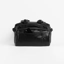 A studio shot of the phone pocket on an All Black Kit Bag 65L
