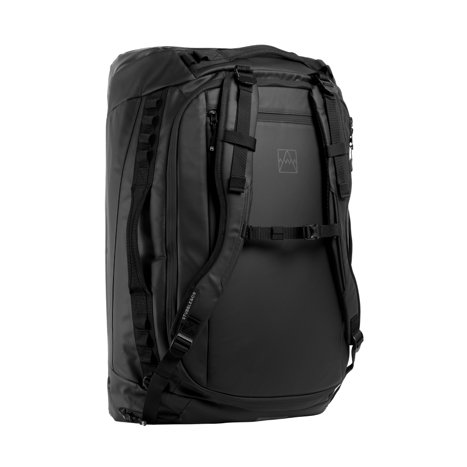 A studio shot of the front and side of a Kit bag 65l as cut out transparent PNG- black