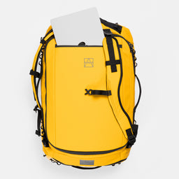A studio shot of the laptop compartment on a Kit Bag 65L in Yellow