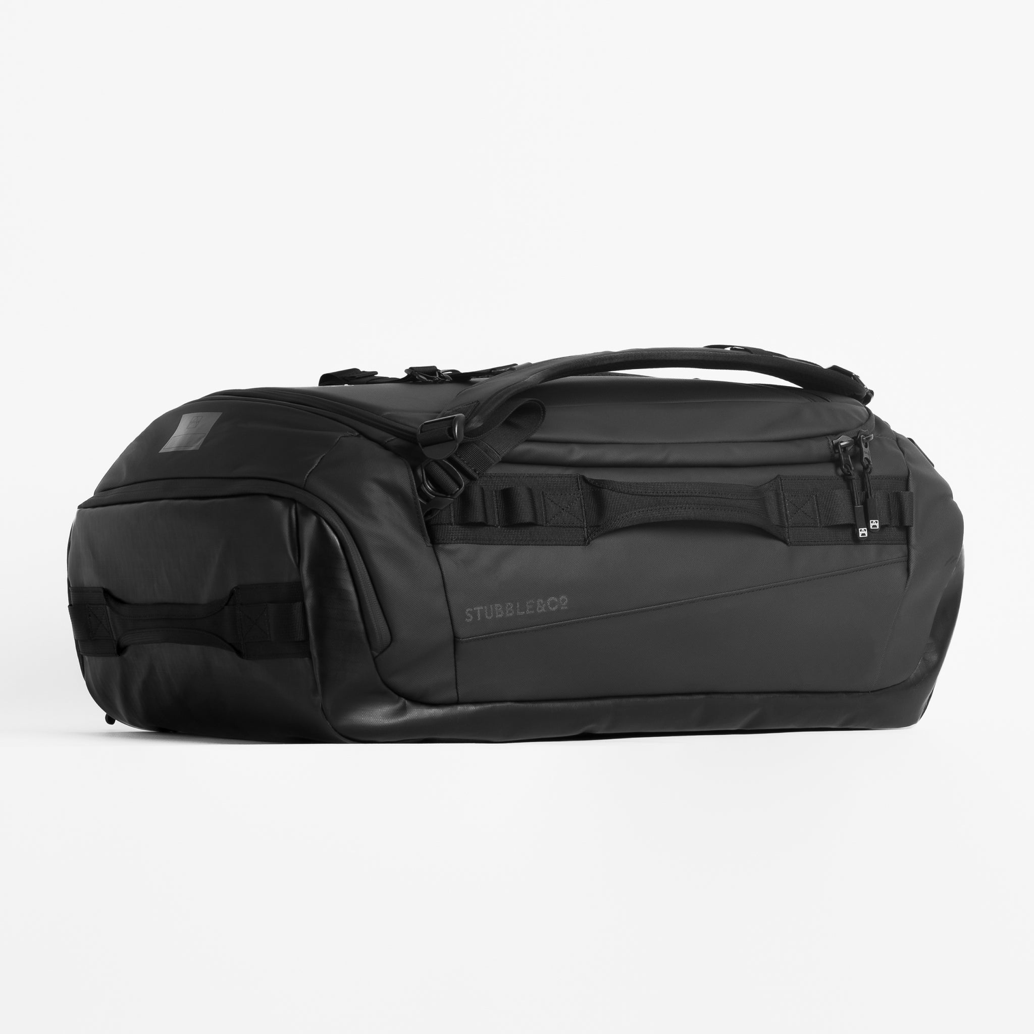 The Kit Bag All Black Backpack angle view