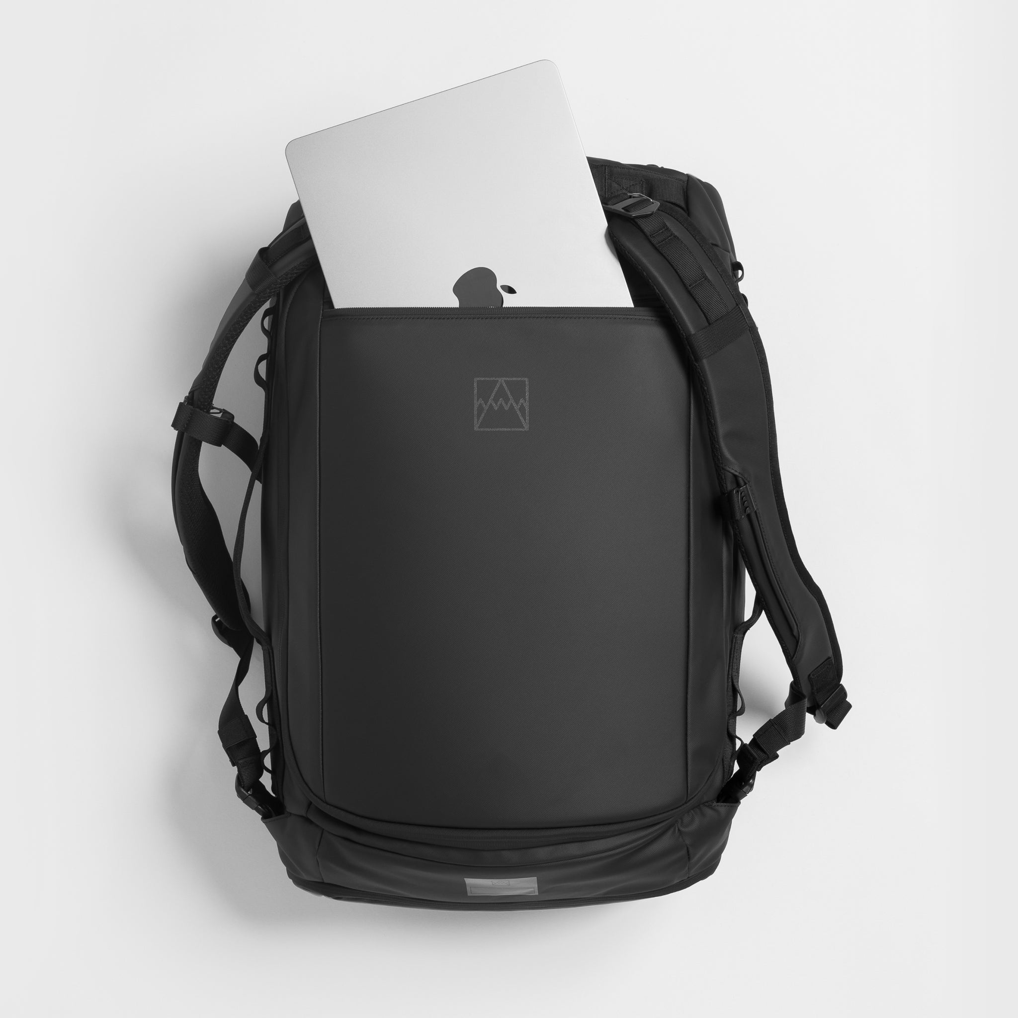 The Kit Bag All Black Backpack top pocket view