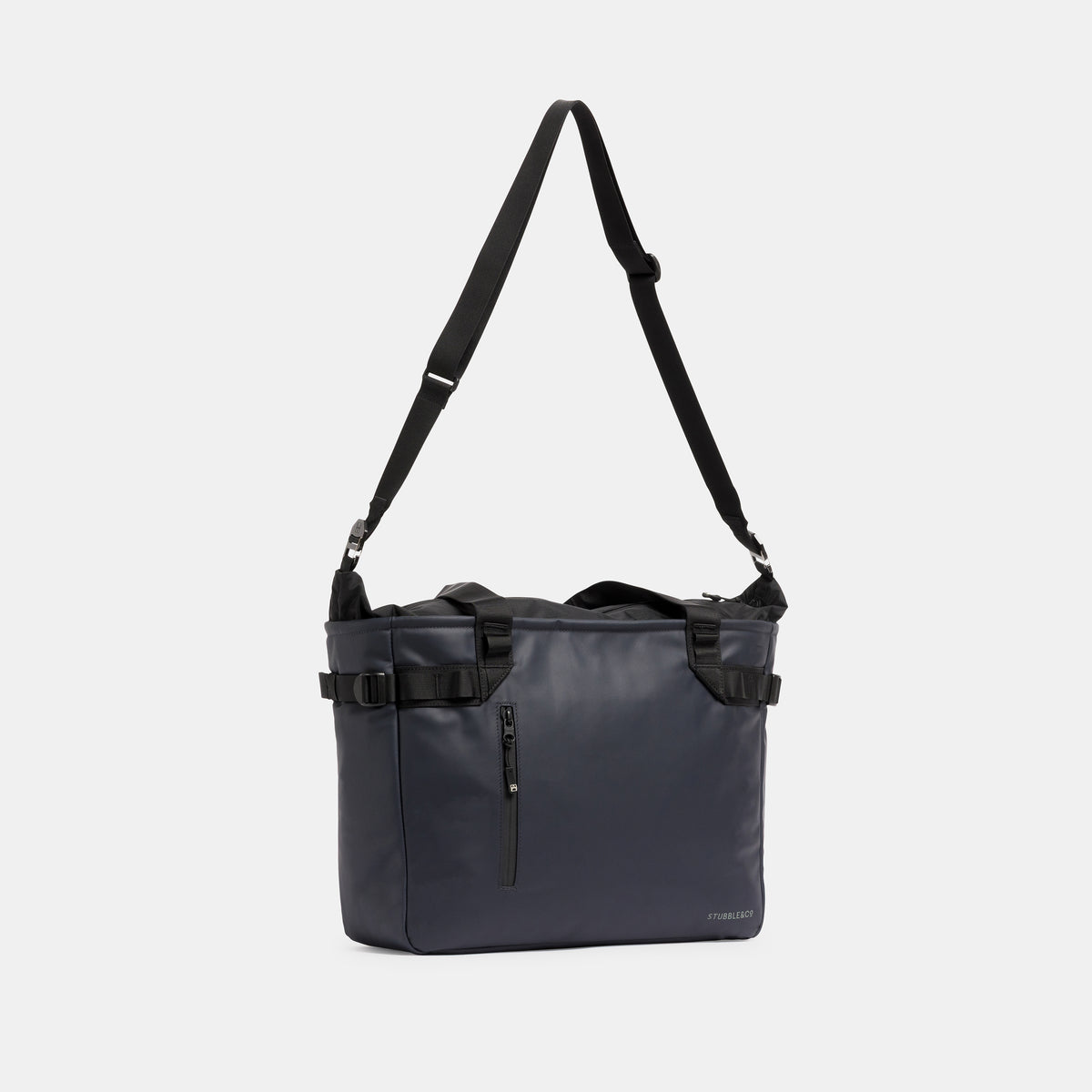 A studio shot of the Midnight Blue Laptop Tote Bag 20L with the shoulder strap hanging