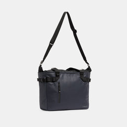 A studio shot of the Midnight Blue Laptop Tote Bag 20L with the shoulder strap hanging
