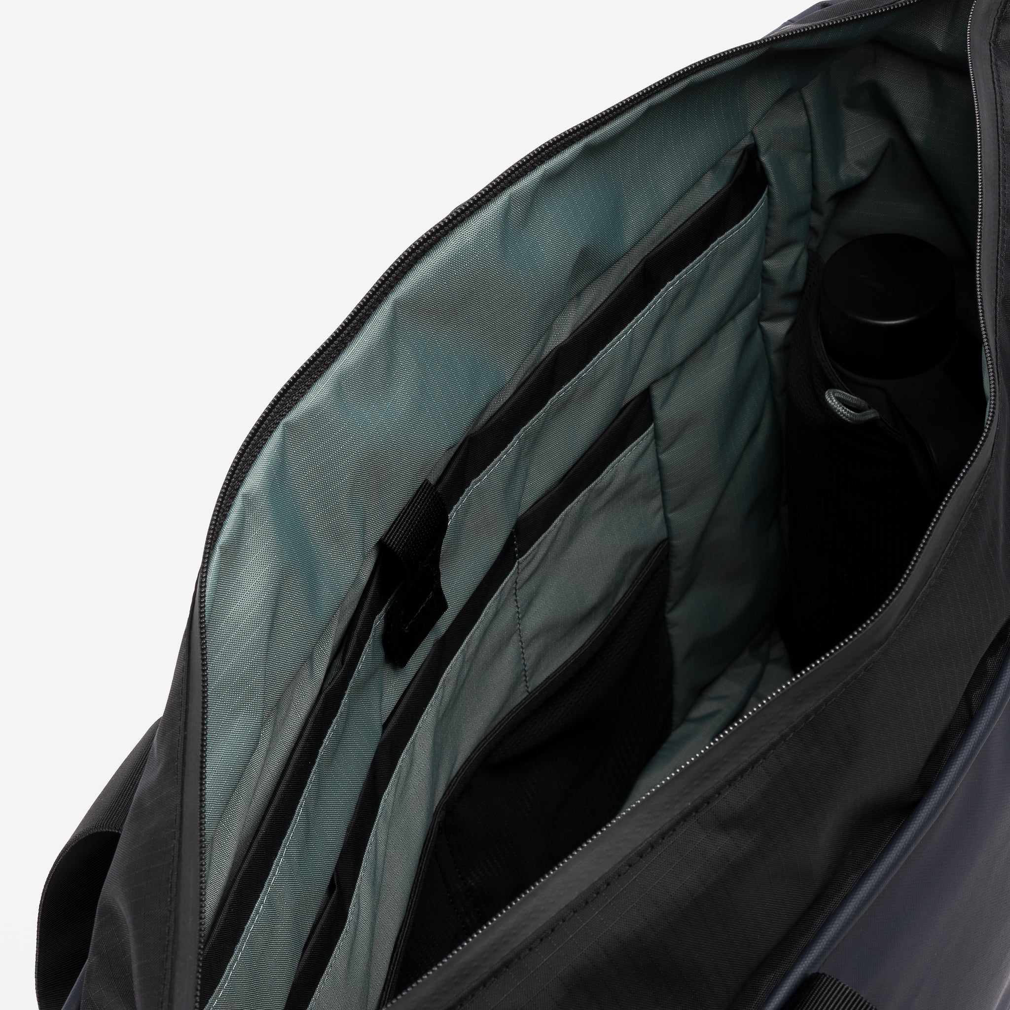 A studio shot of the interior lining and organisation in the Midnight Blue Laptop Tote 20l