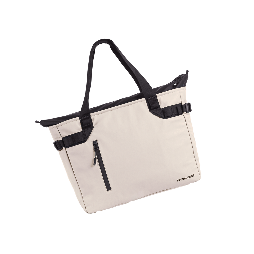 A studio shot of the front and side of a laptop tote 20l as cut out transparent PNG- sand