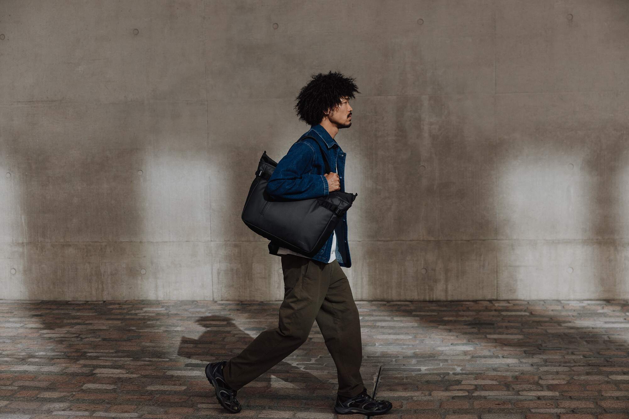 Man walking with a Tote bag 