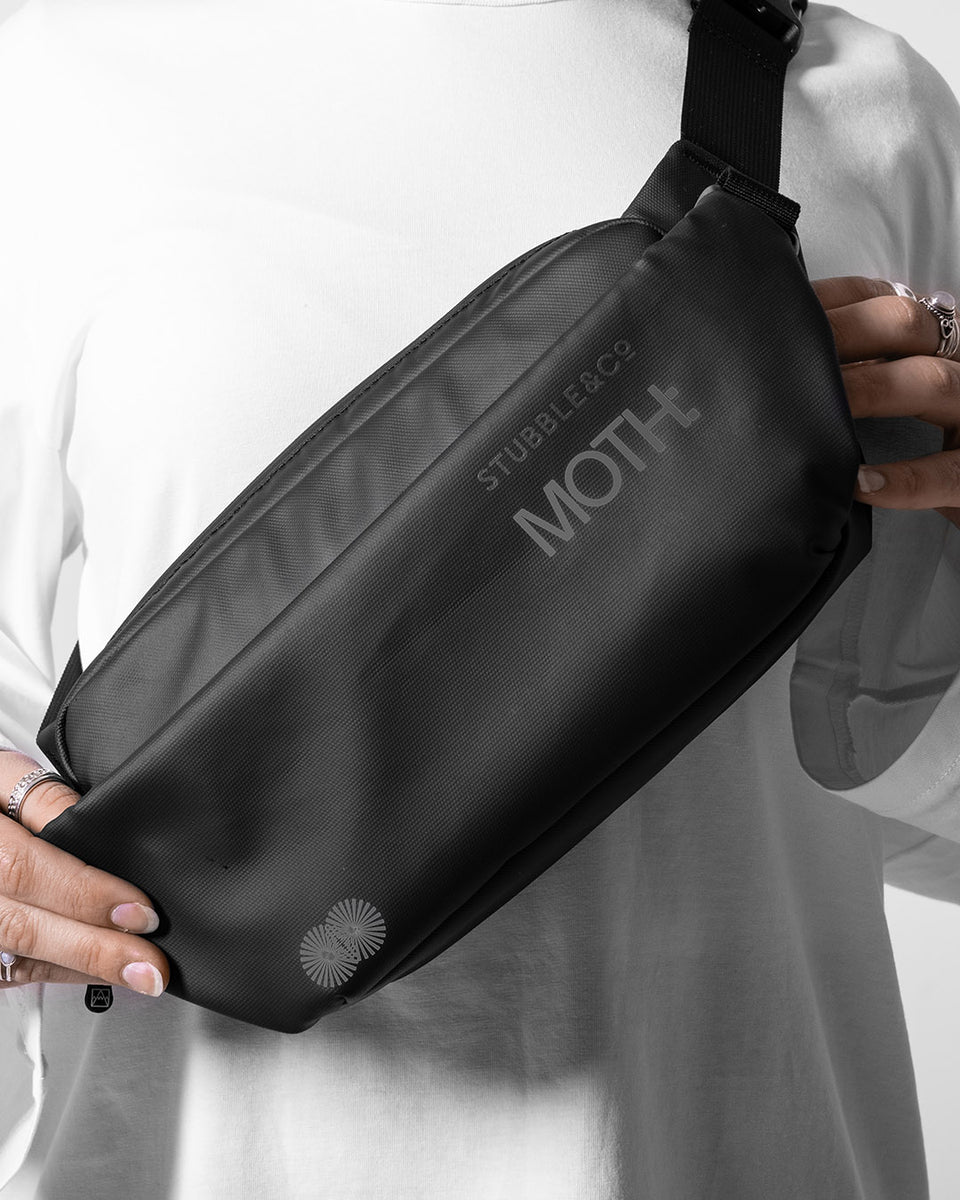 A man wearing a MOTH X Stubble & Co Crossbody Cooler on his chest