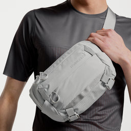 A close up shot of the Ash Motion Sling 4L on a mans chest