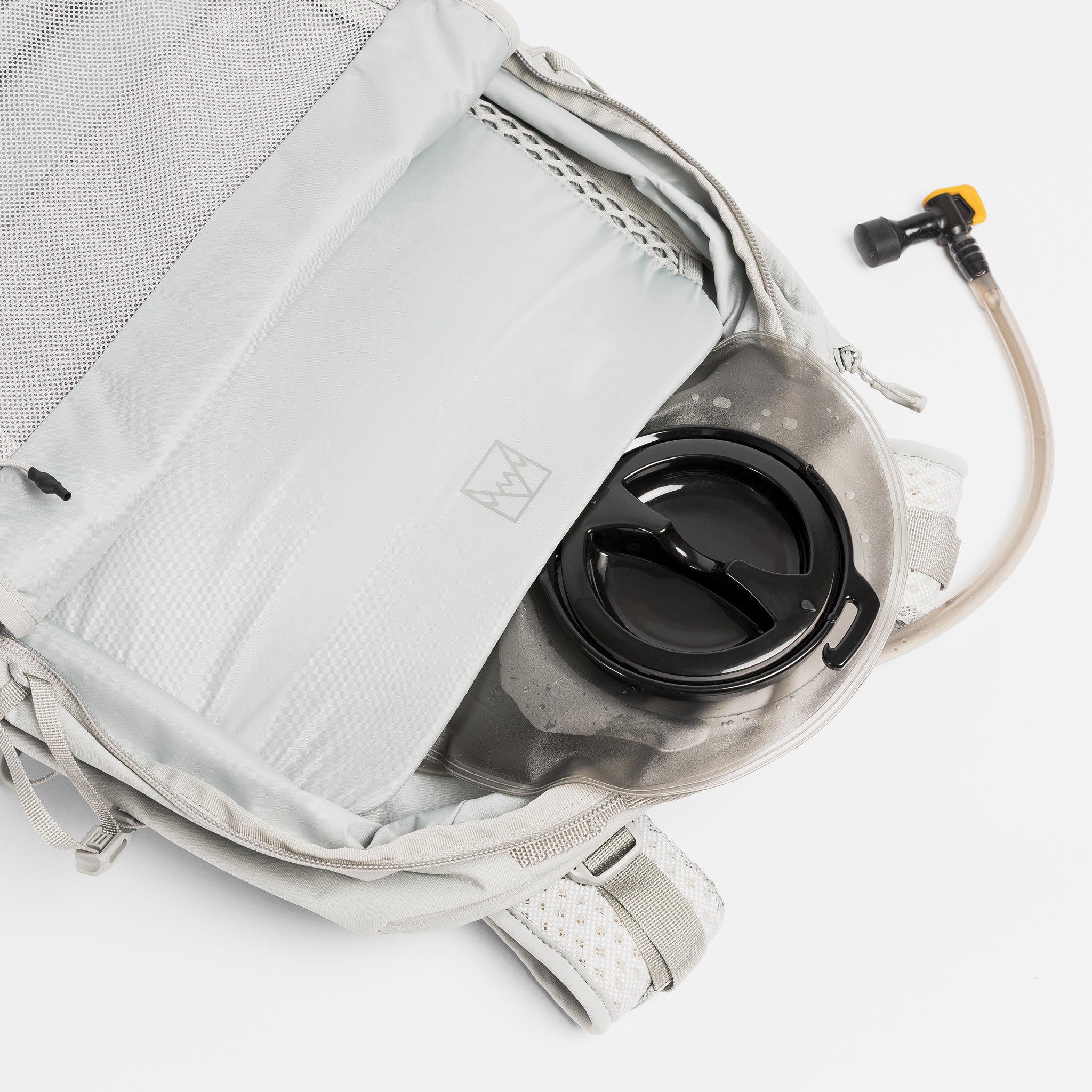 A studio shot of the hydration compartment within the Motion Adventure Pack 38L in Ash