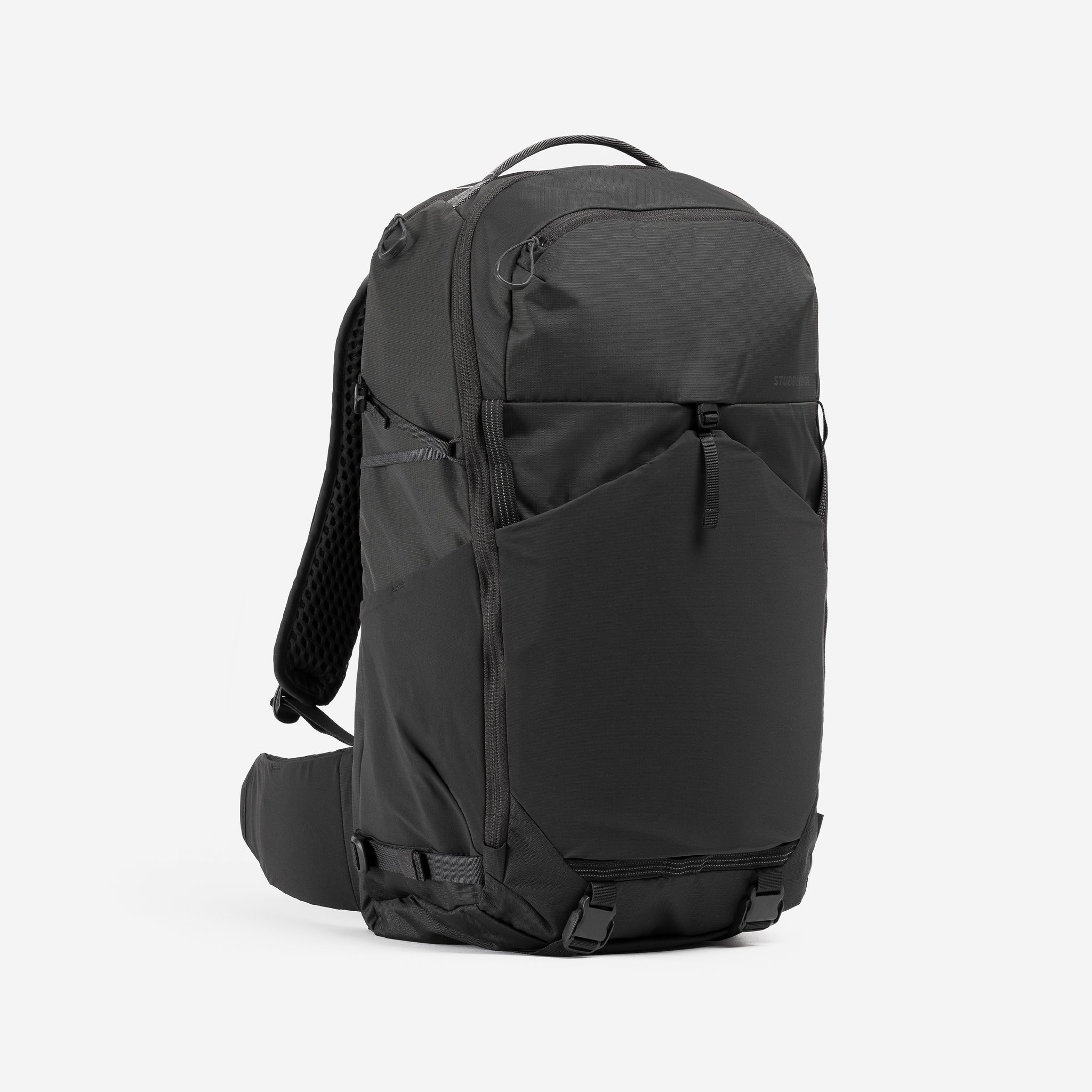 Motion Adventure Pack 38L in Charcoal, front angle with straps tucked away.
