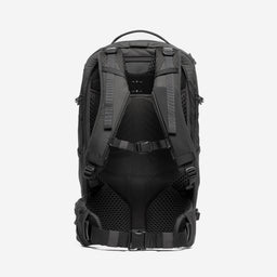 A studio shot of the back panel and adjustable torso height technology on the Motion Adventure Pack 38L in Charcoal