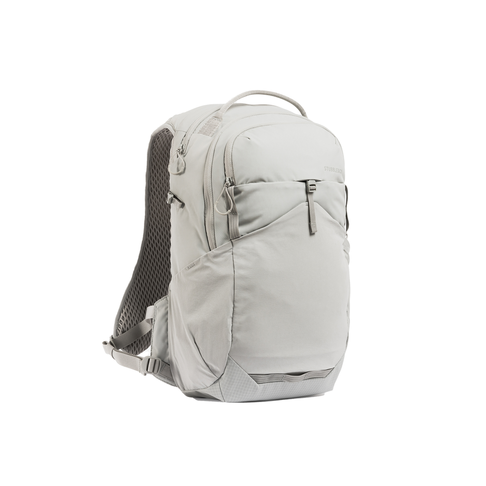 A studio shot of the front and side of an motion backpack 20l as cut out transparent PNG- ash