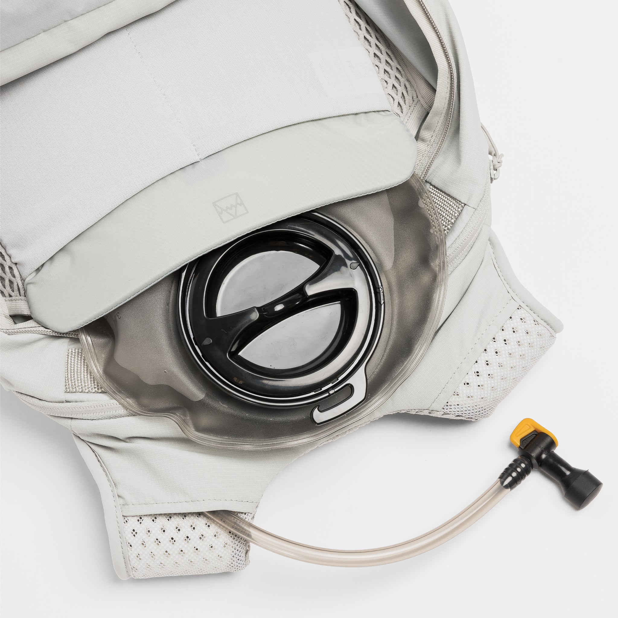 A studio shot of the hydration reservoir within the Ash Motion Backpack 20L