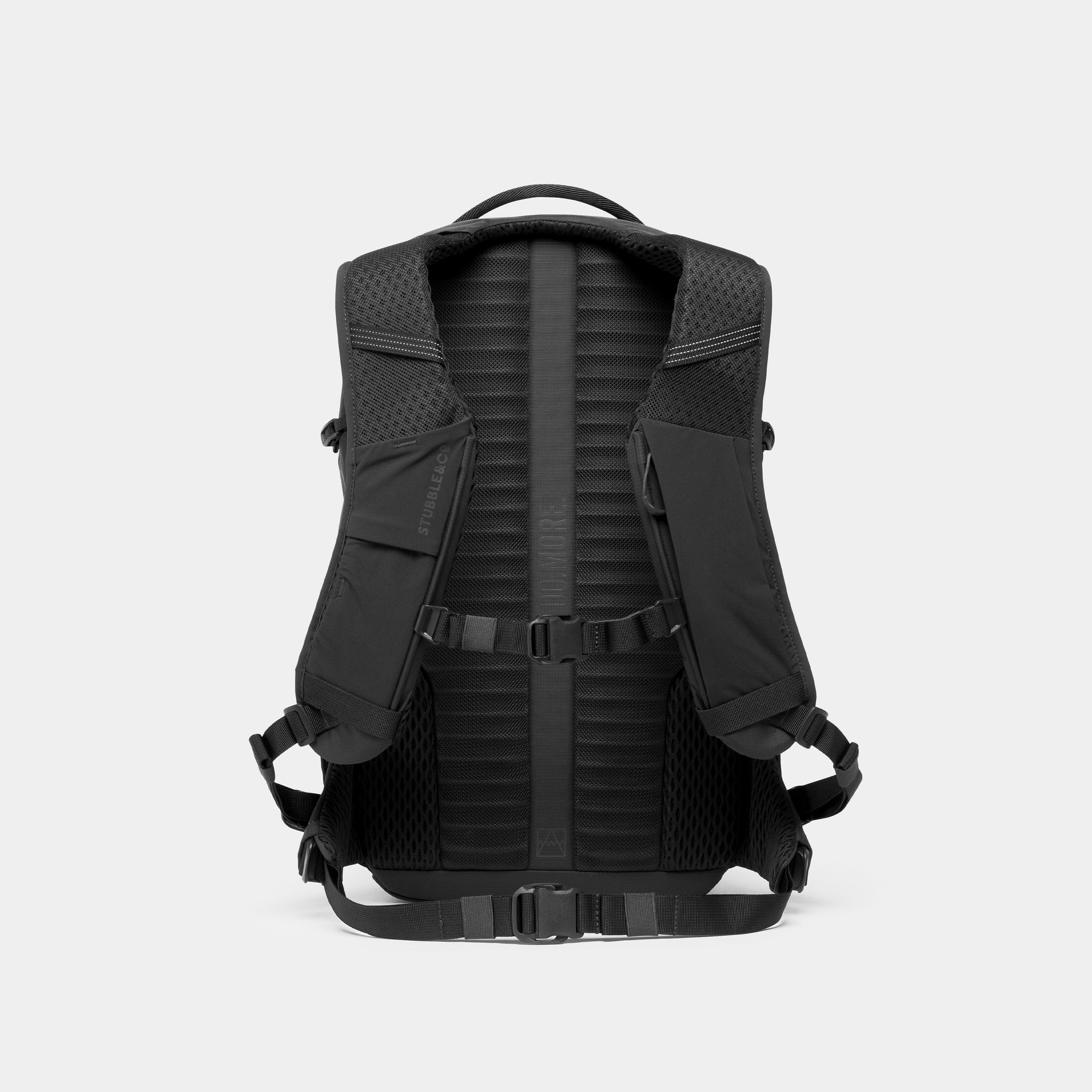 A studio shot of the back panel and chest straps on the Charcoal Motion Backpack 20L