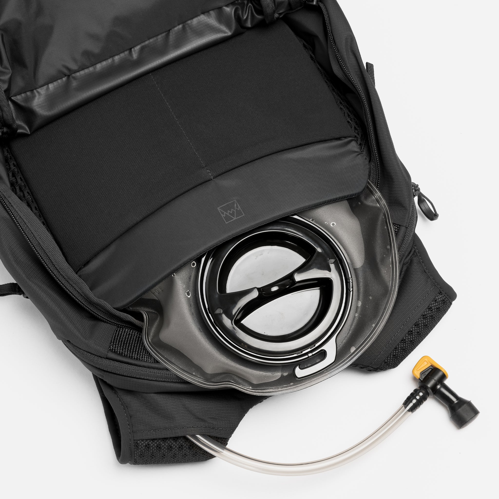 A studio shot of the hydration reservoir within the Charcoal Motion Backpack 20L