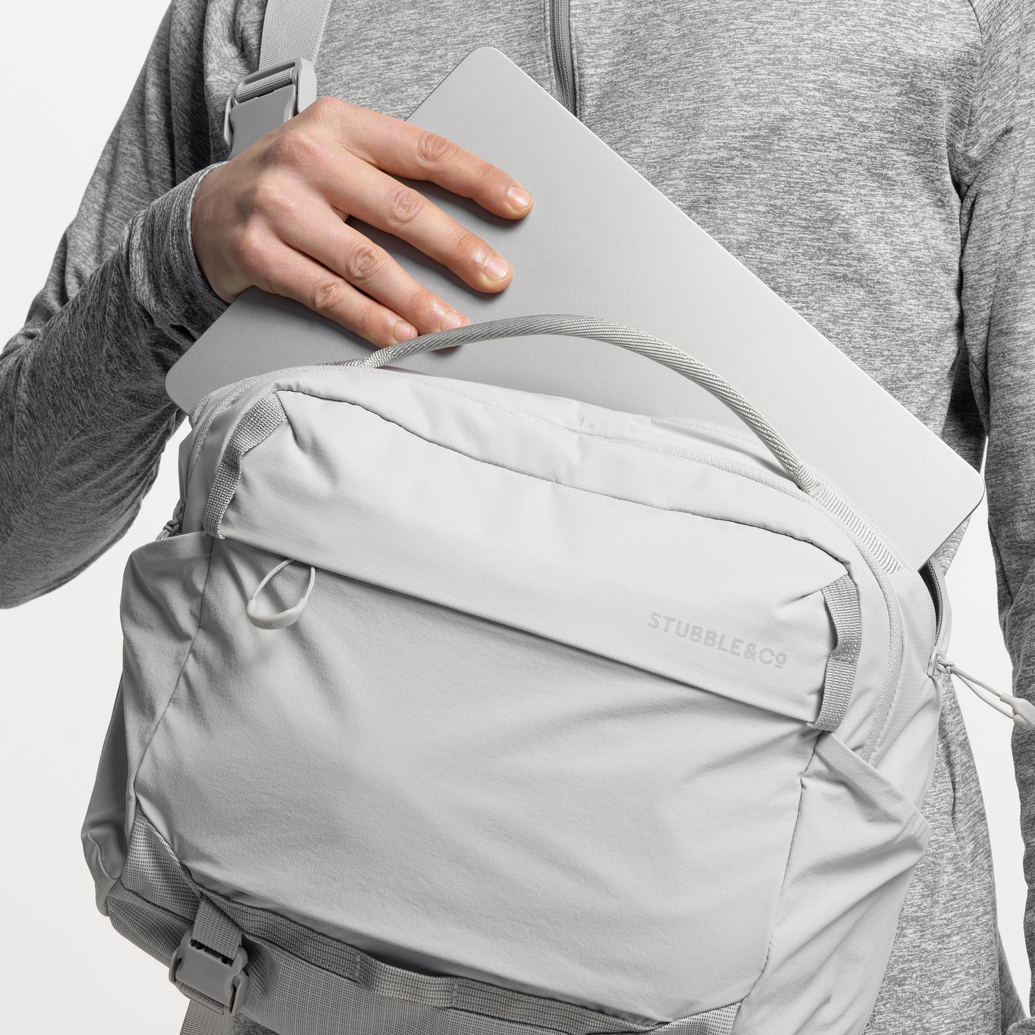 A close up shot of the internal laptop compartment for the Ash Magma and Charcoal Motion Sling 15L