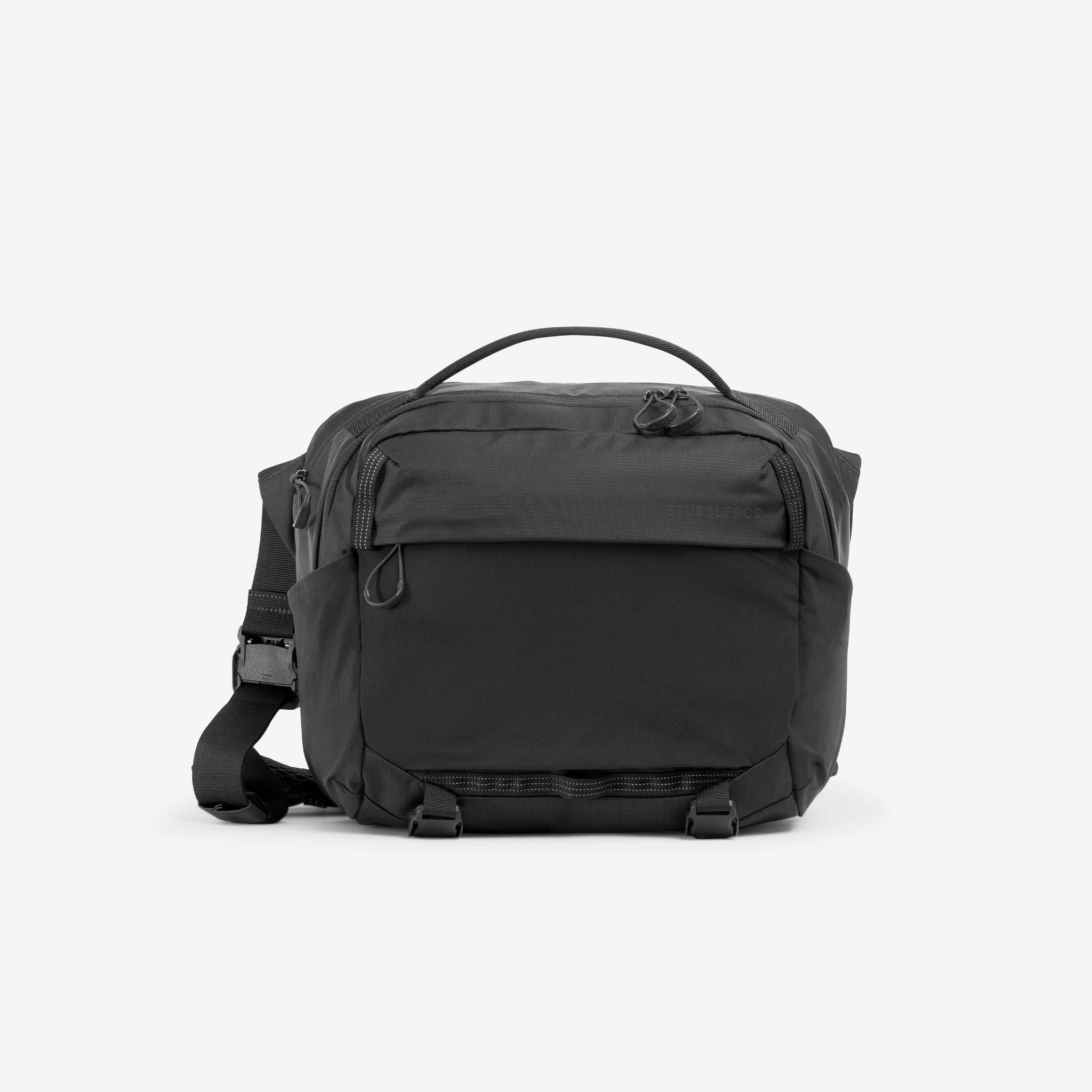 A studio shot of the front of the Charcoal Motion Sling 15L