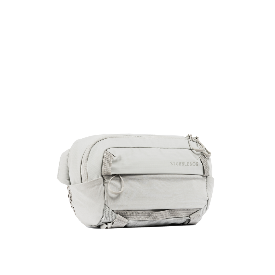 A studio shot of the front and side of an motion sling 4l as cut out transparent PNG-ash