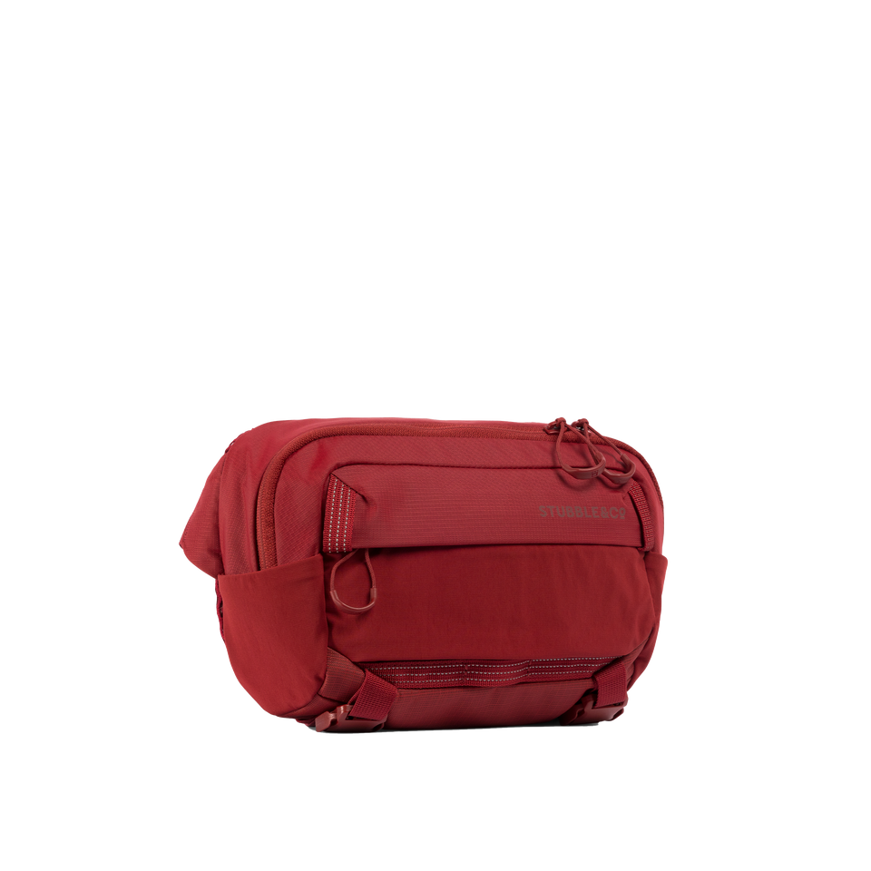 A studio shot of the front and side of an motion sling 4l as cut out transparent PNG-magma