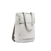 A studio shot of the front and side of an motion tote pack 18l as cut out transparent PNG- ash