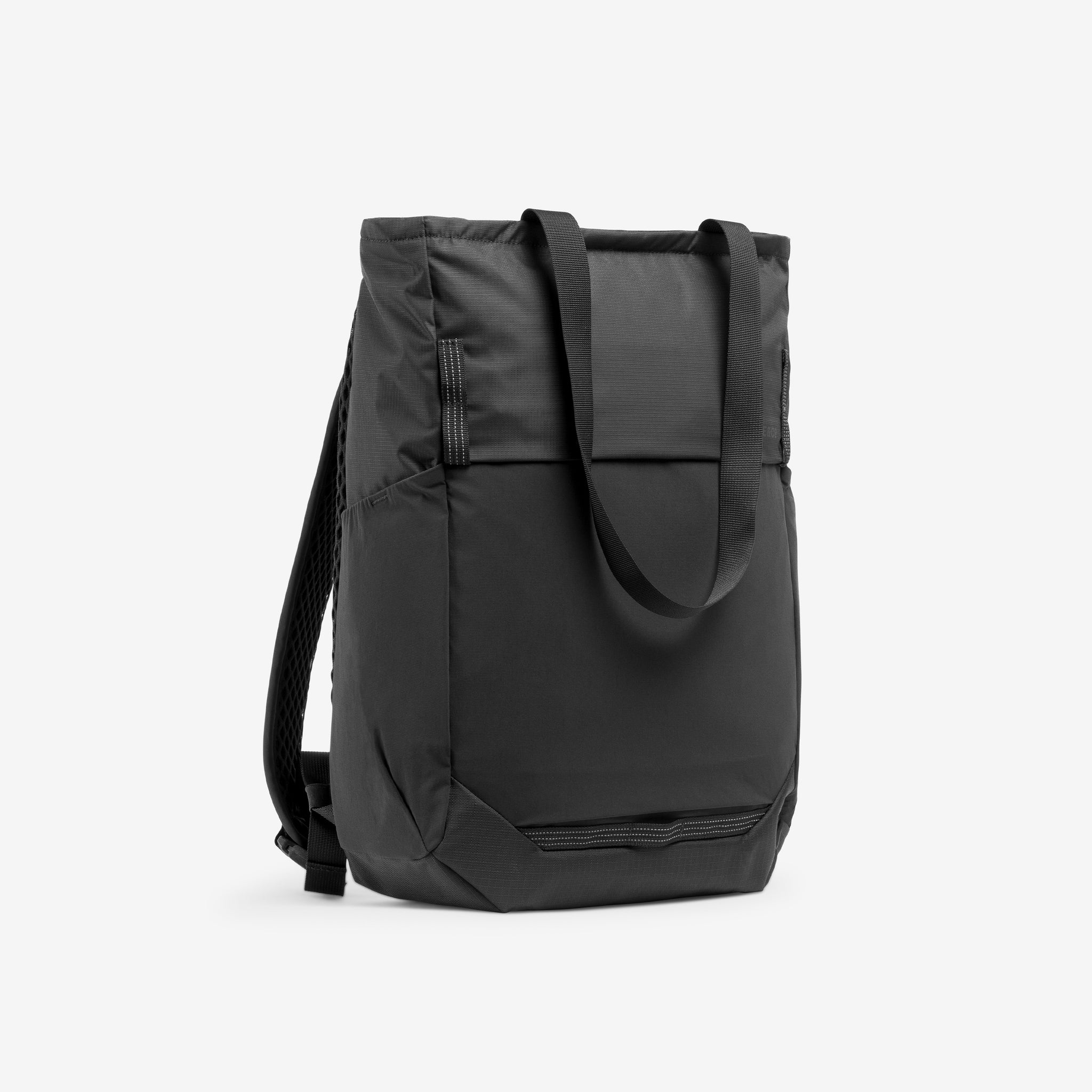 A studio shot of the front and side Charcoal Motion Tote Pack 18L