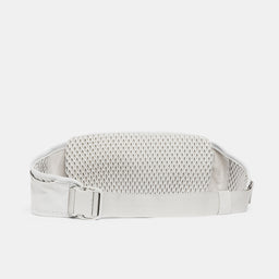 A studio shot of the back and quick release clip on the Ash Motion Waist Pack 2L