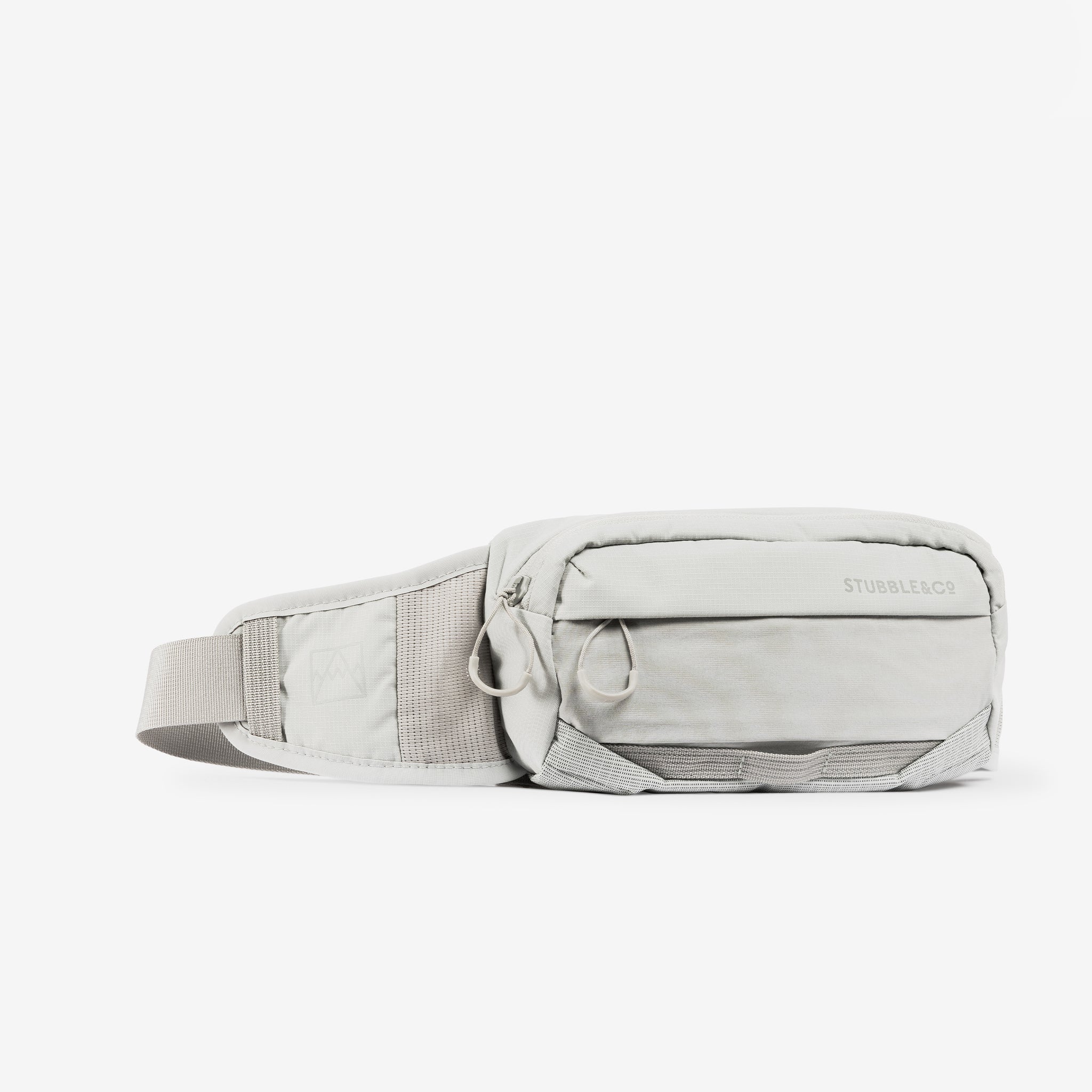 A studio shot of the front and side of the Ash Motion Waist Pack 2L